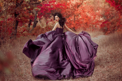 woman in dramatic purple dress