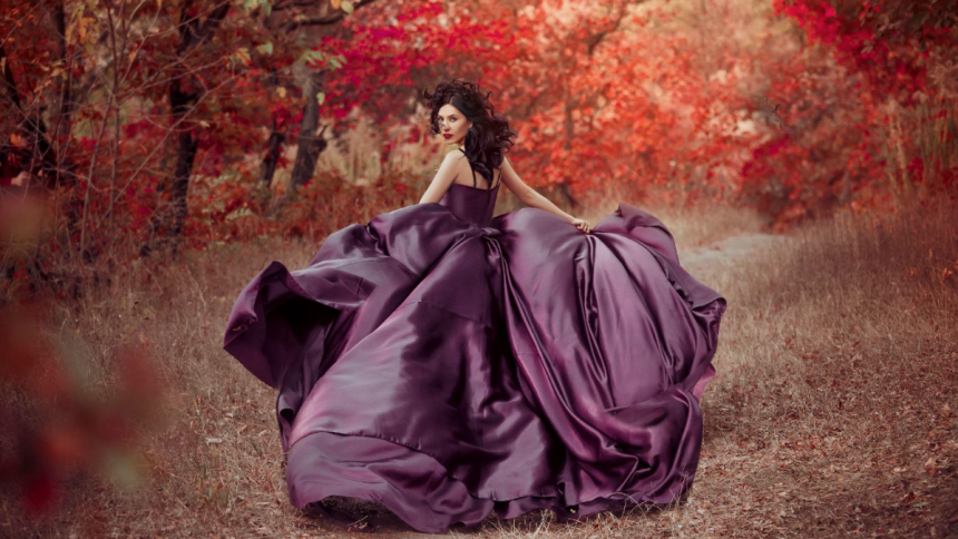 woman in dramatic purple dress