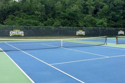 Why Tennis Courts Need Custom Windscreens for Branding