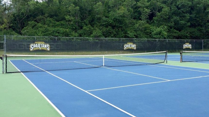 Why Tennis Courts Need Custom Windscreens for Branding